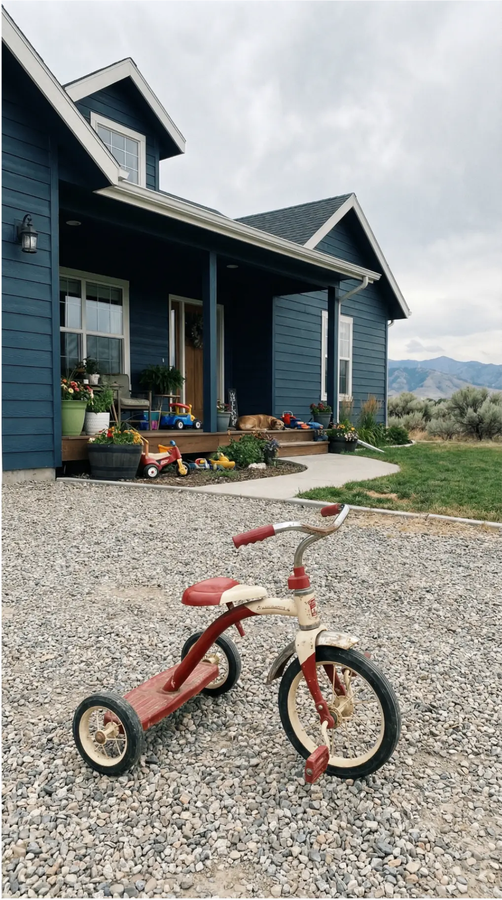 Blue Idaho home with a finished roof and residential exterior